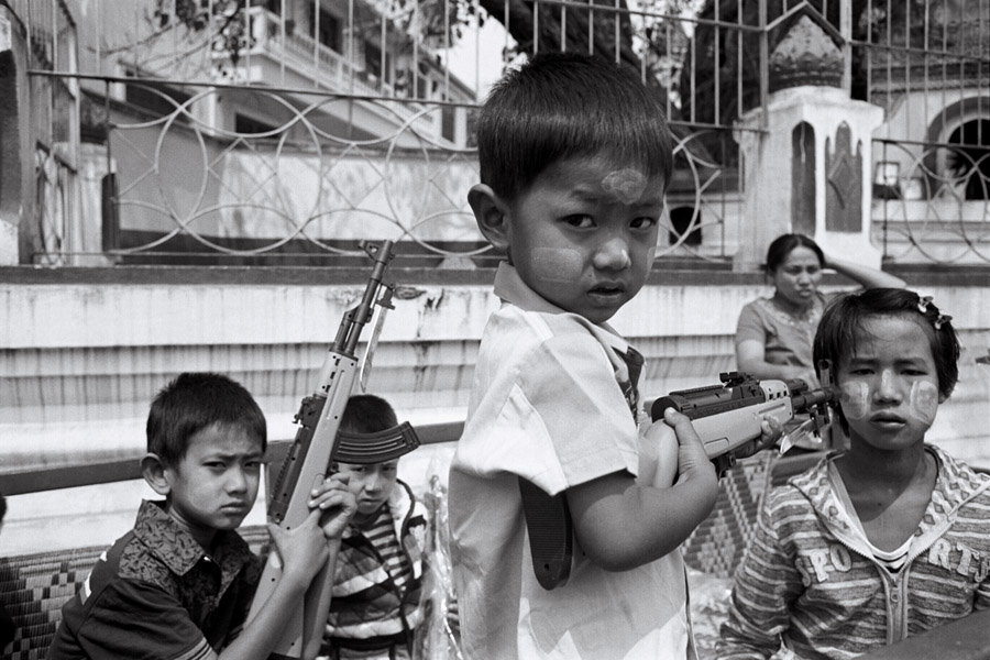 Kyaingtong, Eastern Shan State 2012: these kids were just playing, but the serious facial expressions were mesmerizing.