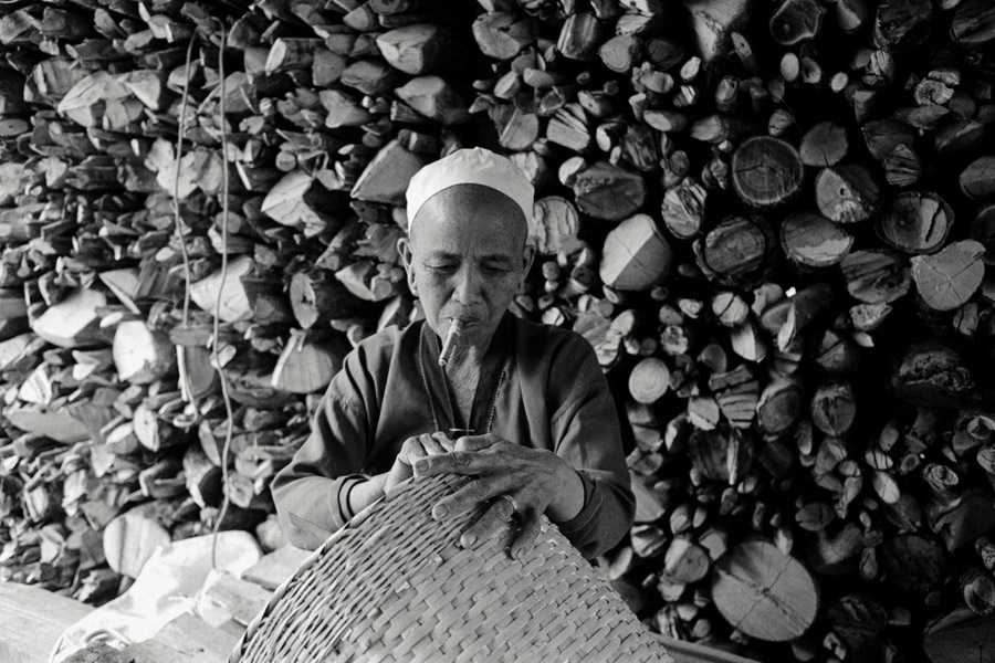 Law Sar village, Northern Shan State 2012: Palaung woman weaving baskets for fishing (for personal use, not for sale).