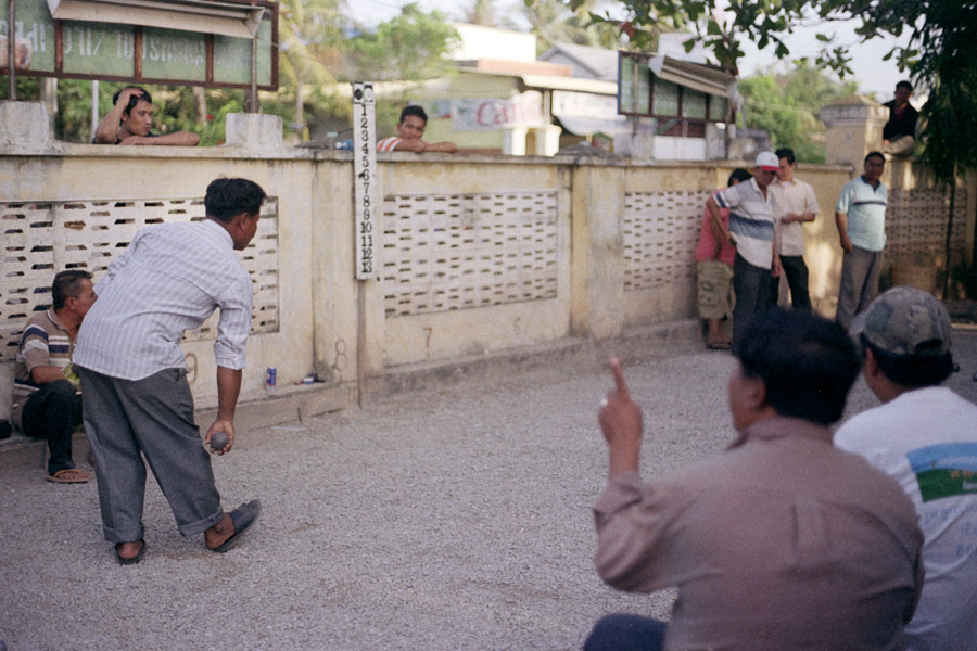 Kampot, Cambodia 2012: men gather in the evenings to play p&eacute;tanque, which is still fairly popular in former French Indochine countries.