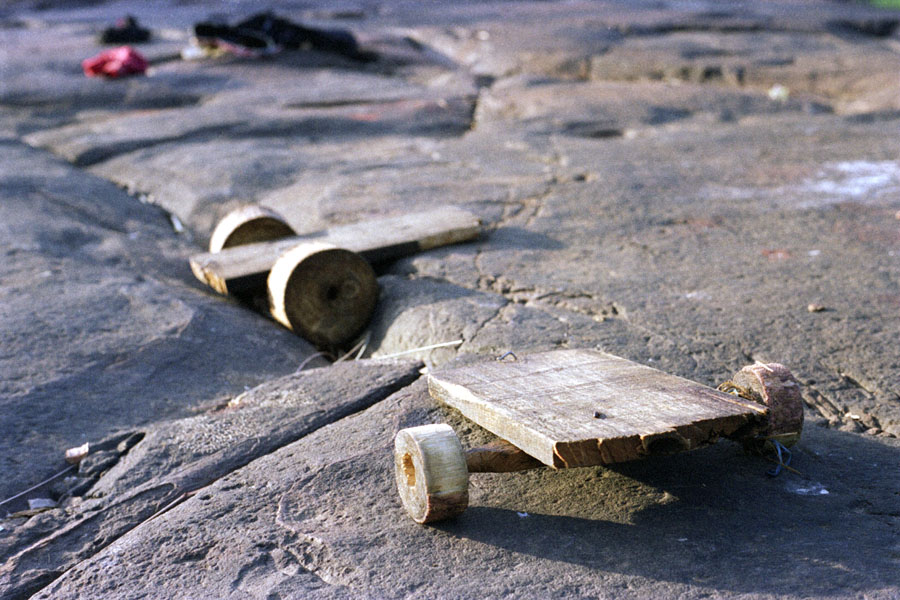 Chi Phat, Cambodia 2012: small handmade carts, used for racing downhill into the lake.