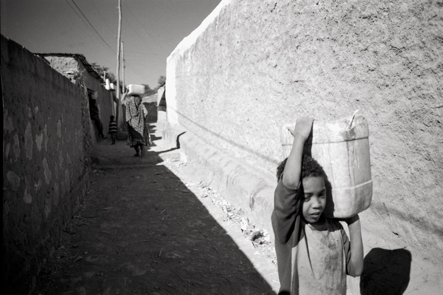 Harar, Ethiopia 2007: throughout Africa, water is refilled into used plastic oil jugs, also known as jerry cans.